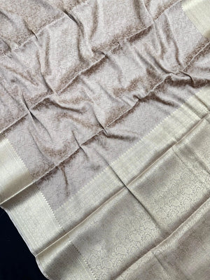 Woman wearing a Binny Crepe Saree with soft, flowing drape and minimal sheen, ideal for office and everyday wear.