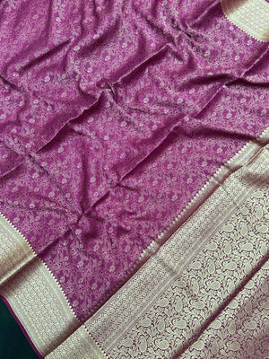 Woman wearing a Binny Crepe Saree with soft, flowing drape and minimal sheen, ideal for office and everyday wear.