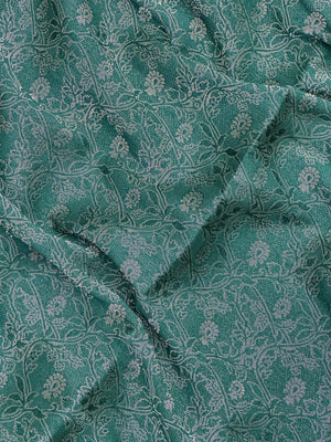 Woman wearing a Binny Crepe Saree with soft, flowing drape and minimal sheen, ideal for office and everyday wear.