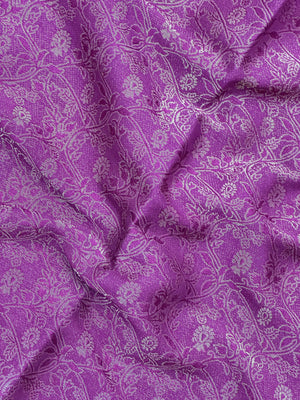 Woman wearing a Binny Crepe Saree with soft, flowing drape and minimal sheen, ideal for office and everyday wear.