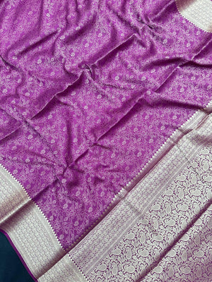 Woman wearing a Binny Crepe Saree with soft, flowing drape and minimal sheen, ideal for office and everyday wear.