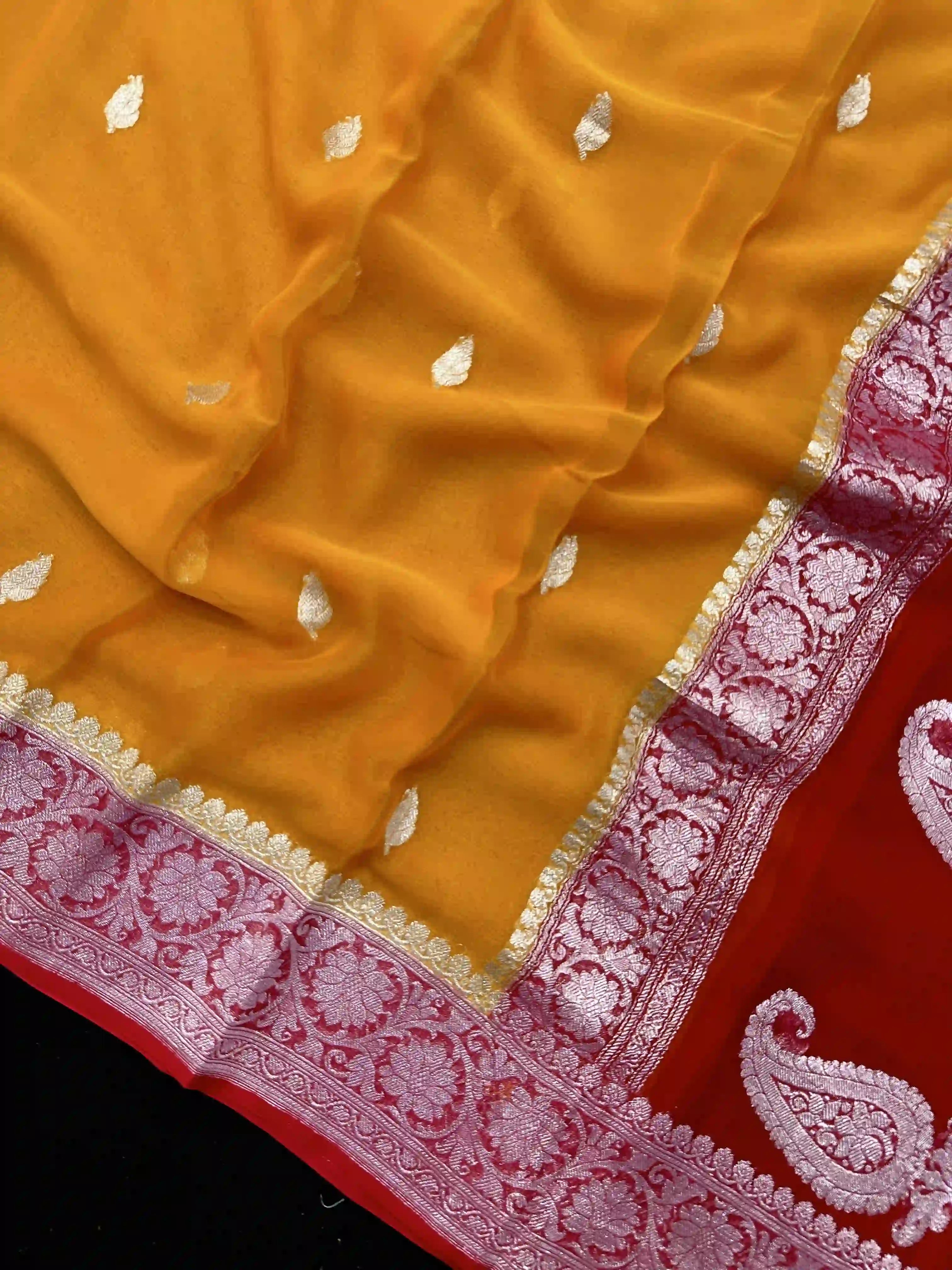 Banarasi Pure Khaddi Chiffon Silver Zari Mustard Yellow Colour Saree With Contrast Red Blouse & Pallu