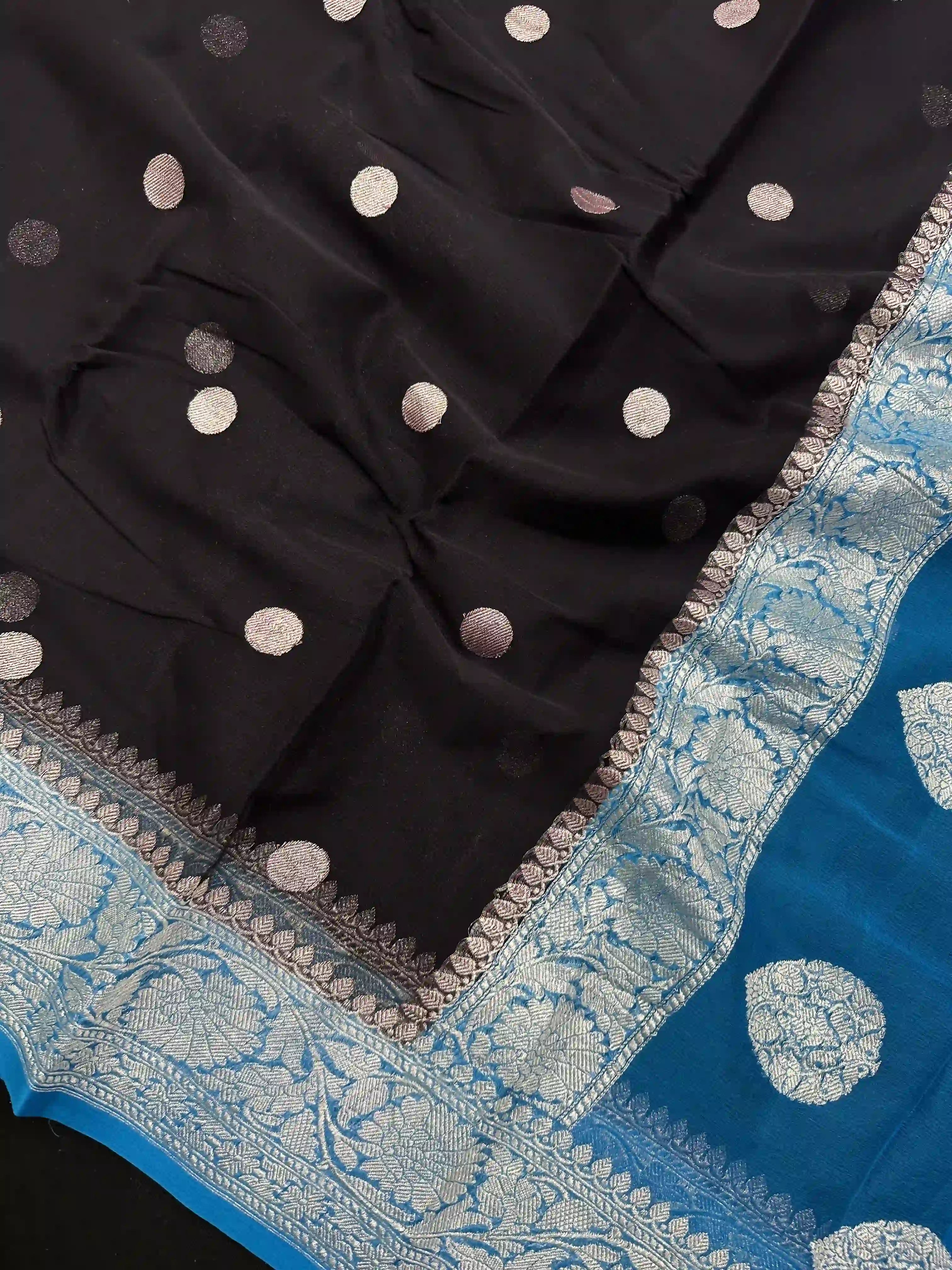 Banarasi Pure Khaddi Chiffon Silver Zari Black Colour Saree With Contrast Sky Blue Blouse & Pallu