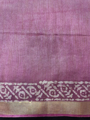 Woman in a soft, elegant Tussar Silk Saree with minimal design, ideal for daily wear, office, and casual traditional settings.