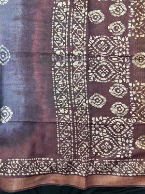 Woman in a soft, elegant Tussar Silk Saree with minimal design, ideal for daily wear, office, and casual traditional settings.