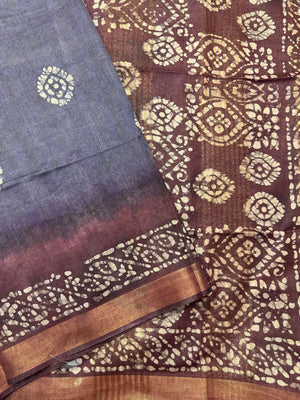 Woman in a soft, elegant Tussar Silk Saree with minimal design, ideal for daily wear, office, and casual traditional settings.