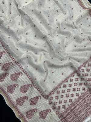 Woman wearing a Linen Silk Saree with soft, breathable texture and subtle shine, ideal for office wear and casual festive occasions.