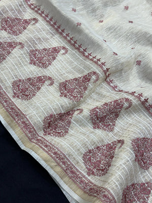 Woman wearing a Linen Silk Saree with soft, breathable texture and subtle shine, ideal for office wear and casual festive occasions.