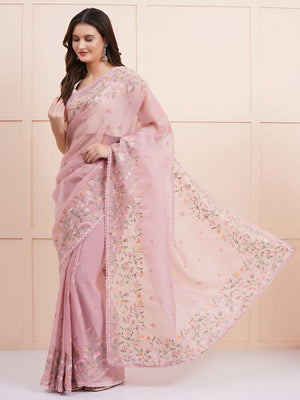 "Elegant light pink organza saree with delicate fabric and intricate details, perfect for a stylish party look and fancy wear. Ideal for formal or semi-formal occasions."