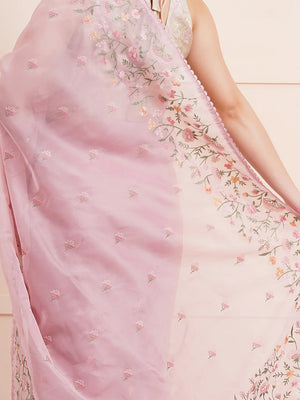 "Elegant light pink organza saree with delicate fabric and intricate details, perfect for a stylish party look and fancy wear. Ideal for formal or semi-formal occasions."