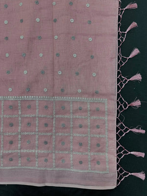 Woman draped in a Linen Silk Saree with natural texture and soft shine – perfect for elegant everyday and office wear.