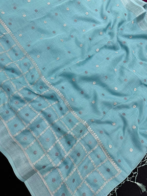 Woman draped in a Linen Silk Saree with natural texture and soft shine – perfect for elegant everyday and office wear.