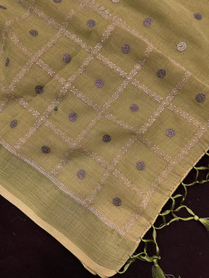 Woman draped in a Linen Silk Saree with natural texture and soft shine – perfect for elegant everyday and office wear.