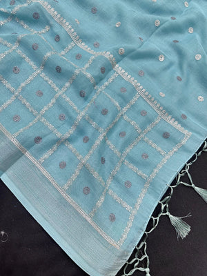 Woman draped in a Linen Silk Saree with natural texture and soft shine – perfect for elegant everyday and office wear.