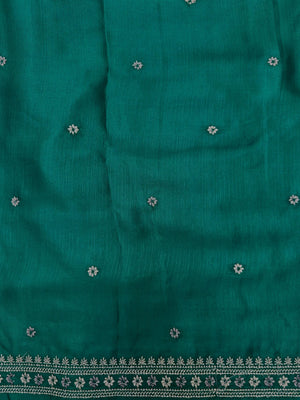 Woman draped in a Linen Silk Saree with natural texture and soft shine – perfect for elegant everyday and office wear.