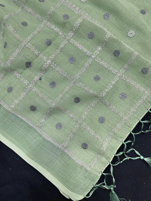 Woman draped in a Linen Silk Saree with natural texture and soft shine – perfect for elegant everyday and office wear.