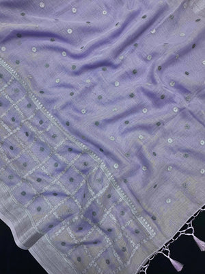 Woman draped in a Linen Silk Saree with natural texture and soft shine – perfect for elegant everyday and office wear.