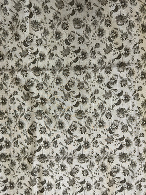 Woman wearing a Milky Cutwork Tussar Silk Saree with delicate embroidery, ideal for day functions and festive occasions.