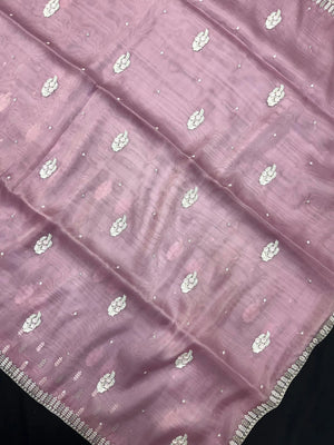 Woman wearing a sheer Organza Saree with elegant detailing and soft flow, perfect for festive events and stylish ethnic occasions.