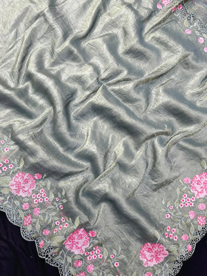 Woman wearing a Paper Silk Saree with crisp texture and elegant drape, ideal for office wear, casual events, and festive occasions.