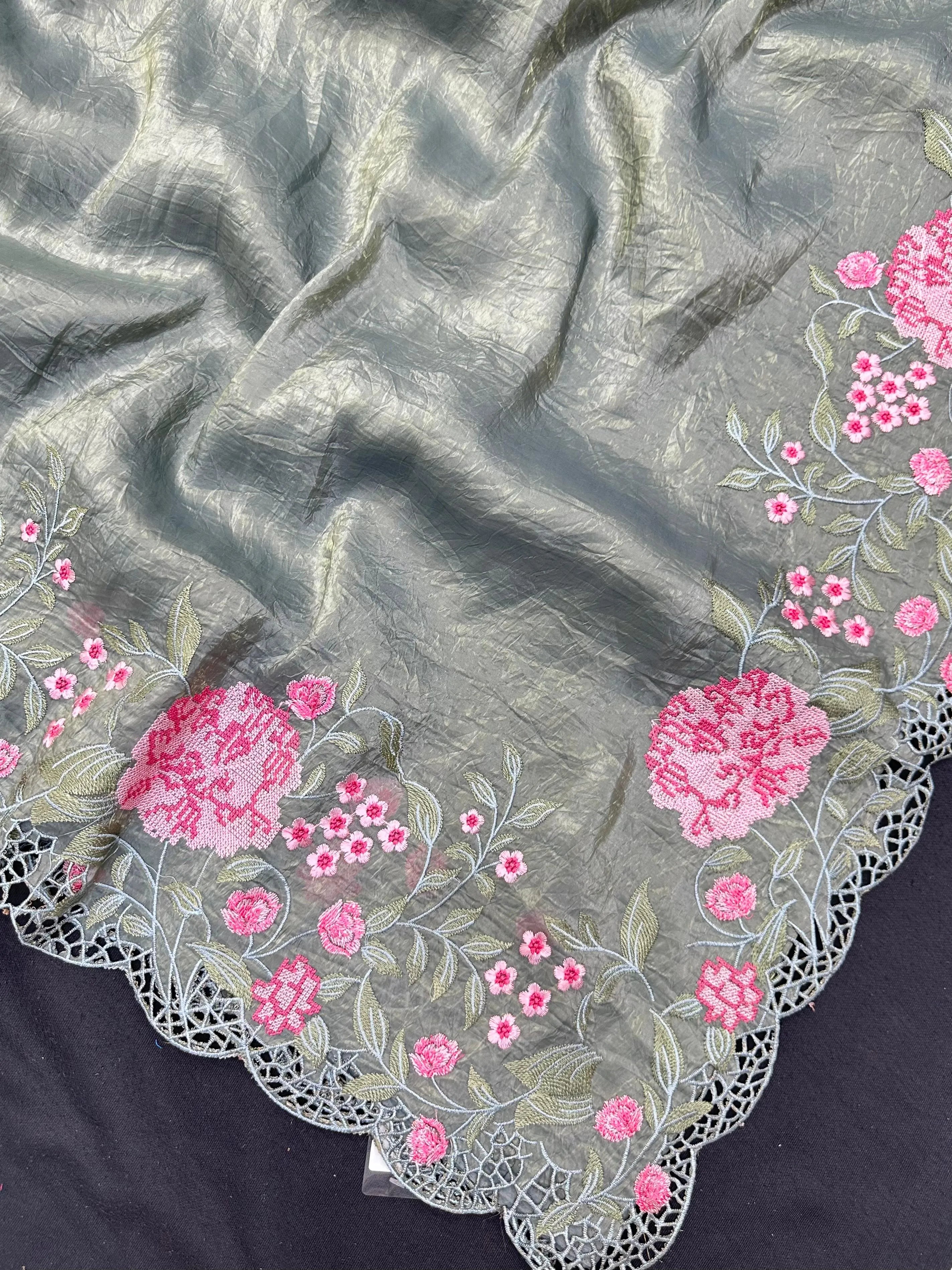 Woman wearing a Paper Silk Saree with crisp texture and elegant drape, ideal for office wear, casual events, and festive occasions.