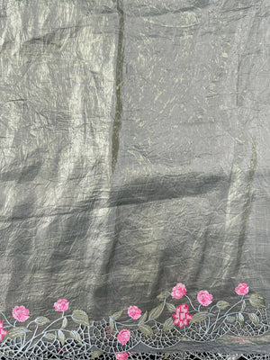 Woman wearing a Paper Silk Saree with crisp texture and elegant drape, ideal for office wear, casual events, and festive occasions.