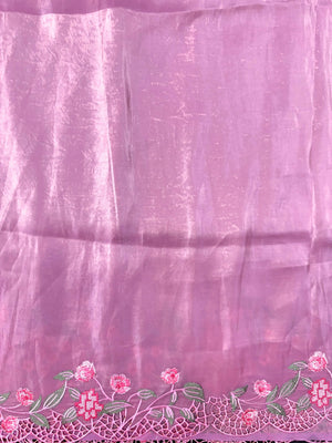 Woman wearing a Paper Silk Saree with crisp texture and elegant drape, ideal for office wear, casual events, and festive occasions.