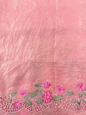 Woman wearing a Paper Silk Saree with crisp texture and elegant drape, ideal for office wear, casual events, and festive occasions.