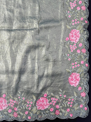 Woman wearing a Paper Silk Saree with crisp texture and elegant drape, ideal for office wear, casual events, and festive occasions.