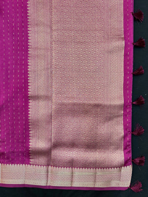 Woman wearing a Party Wear Semi Silk Saree with rich shine and elegant drape, ideal for festive events and evening parties.