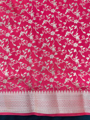 Woman wearing a Party Wear Semi Silk Saree with rich shine and elegant drape, ideal for festive events and evening parties.