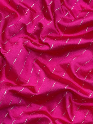 Woman wearing a Party Wear Semi Silk Saree with rich shine and elegant drape, ideal for festive events and evening parties.