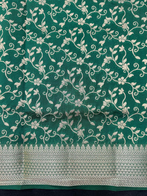 Woman wearing a Party Wear Semi Silk Saree with rich shine and elegant drape, ideal for festive events and evening parties.