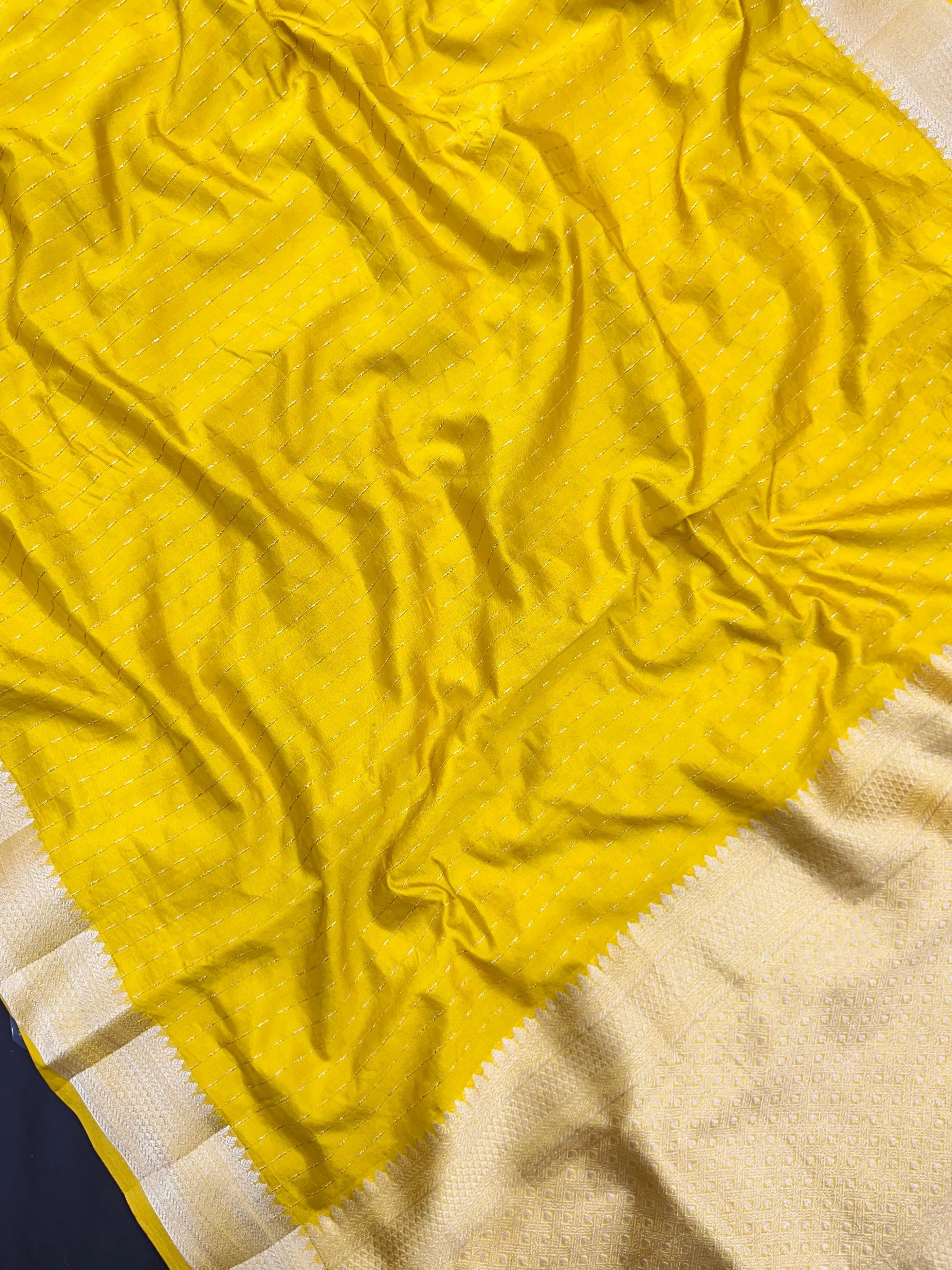 Woman wearing a Party Wear Semi Silk Saree with rich shine and elegant drape, ideal for festive events and evening parties.