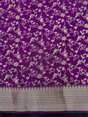 Woman wearing a Party Wear Semi Silk Saree with rich shine and elegant drape, ideal for festive events and evening parties.