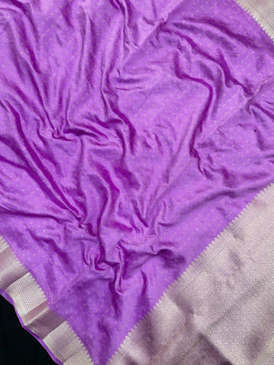 Woman wearing a Party Wear Semi Silk Saree with rich shine and elegant drape, ideal for festive events and evening parties.