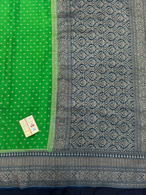 Pure Banarasi crepe silk saree with rich zari detailing and soft drape – ideal for festive and bridal occasions