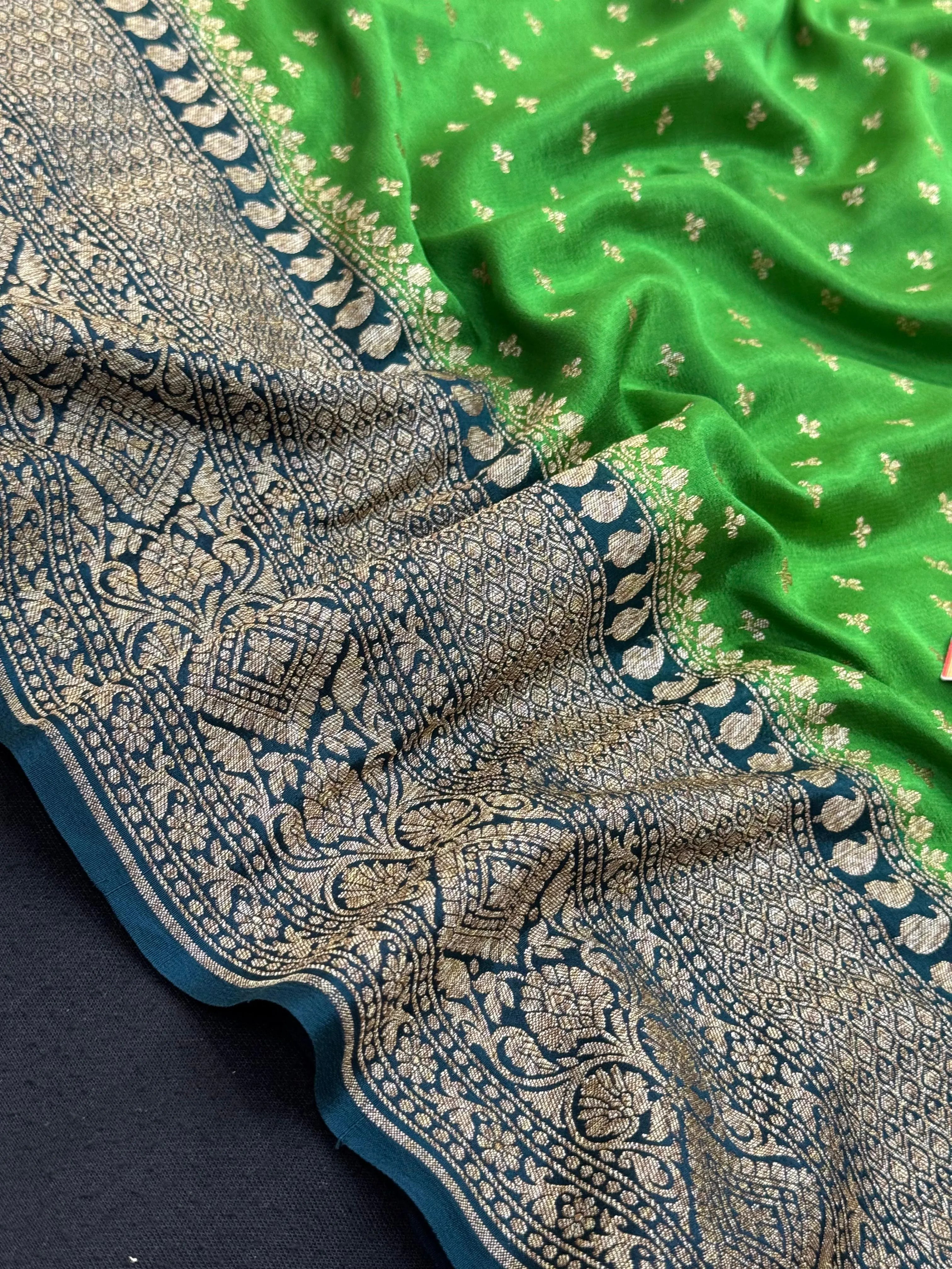 Pure Banarasi crepe silk saree with rich zari detailing and soft drape – ideal for festive and bridal occasions