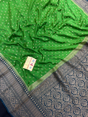 Pure Banarasi crepe silk saree with rich zari detailing and soft drape – ideal for festive and bridal occasions