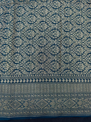 Pure Banarasi crepe silk saree with rich zari detailing and soft drape – ideal for festive and bridal occasions