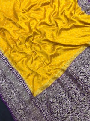 Model wearing a Pure Banarasi Crepe Silk Saree featuring rich zari motifs and a soft, flowing texture – perfect for weddings and festive events.