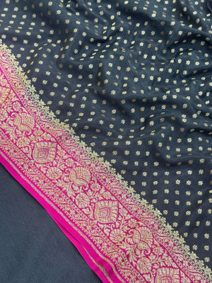 Woman draped in a Pure Banarasi Crepe Silk Saree with soft crepe texture and intricate zari work, perfect for weddings and festive occasions.