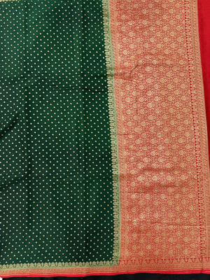 Pure Banarasi crepe silk saree with rich zari motifs and elegant soft drape – ideal for festive and wedding occasions