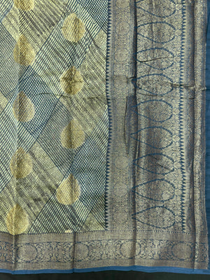 "Sleek Pure Chinya silk saree with intricate detailing, ideal for festive and wedding occasions, showcasing elegance and classic style."