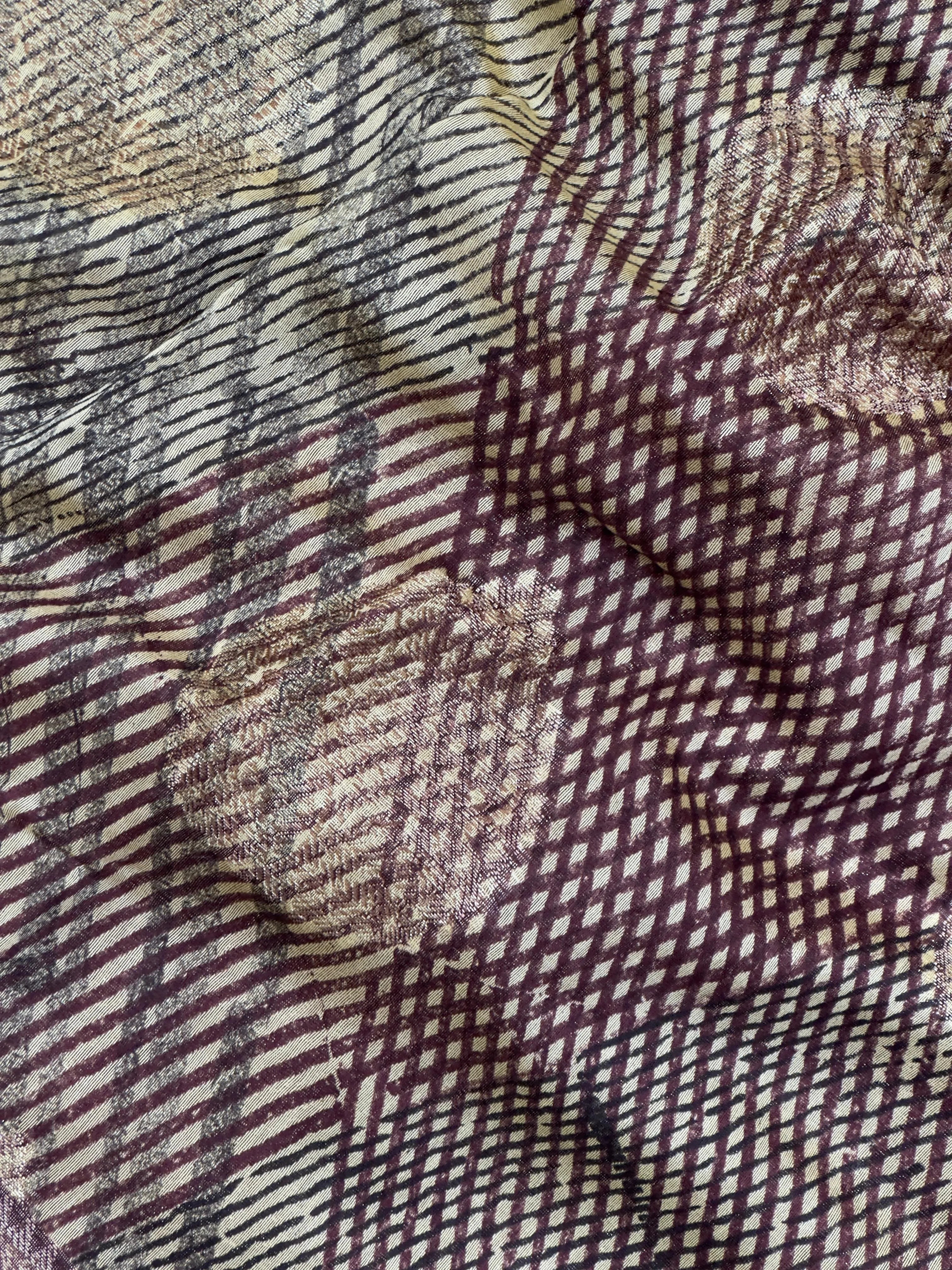 "Sleek Pure Chinya silk saree with intricate detailing, ideal for festive and wedding occasions, showcasing elegance and classic style."