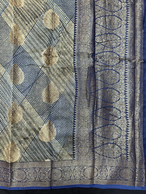 "Sleek Pure Chinya silk saree with intricate detailing, ideal for festive and wedding occasions, showcasing elegance and classic style."