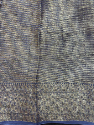 "Sleek Pure Chinya silk saree with intricate detailing, ideal for festive and wedding occasions, showcasing elegance and classic style."