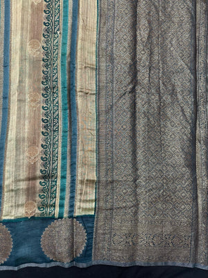 Woman wearing a traditional Chinya Silk Saree in elegant colors with woven pallu and festive motifs, ideal for weddings and Indian celebrations.