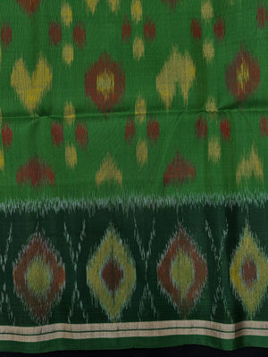 Woman wearing a Pure Dupion Silk Saree with vibrant Pochampally Ikat pallu – a stylish blend of texture and tradition.