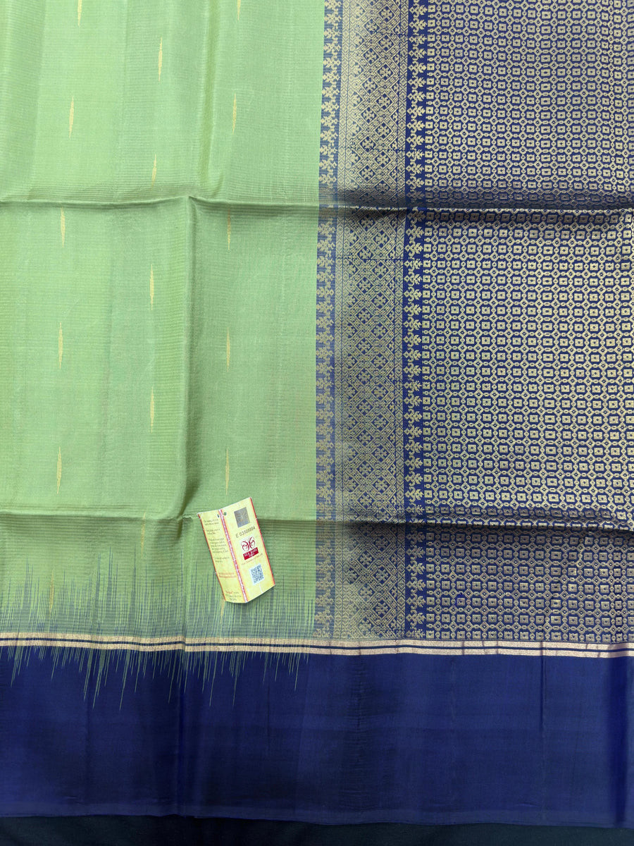 "Pure Kanjivaram Saree with intricate golden zari work, showcasing traditional wear and ethnic elegance. Perfect for weddings and festive occasions."